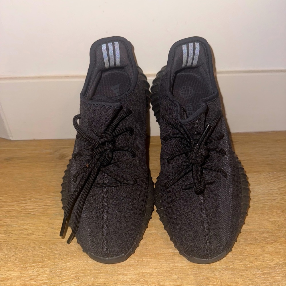 Yeezy Women’s Black Knit Lace-Up Sneakers with Reflective Heel Stripes